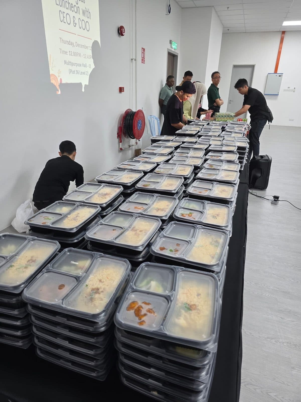 Our crew setting out bento for a company luncheon